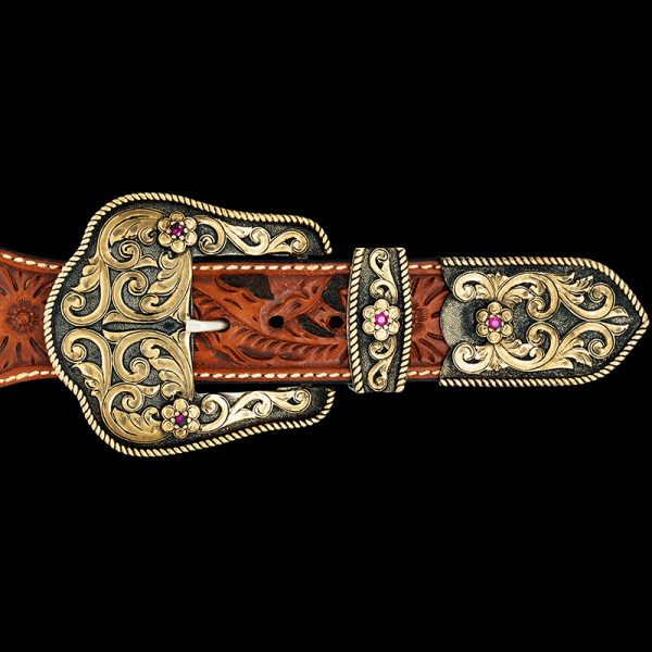 Show off your traditional Western style with the Winthrop Three Piece Buckle Set. Featuring an antiqued silver base with intrincate bronze scrollwork and customizable stone color, this set is every cowgirl's dream!